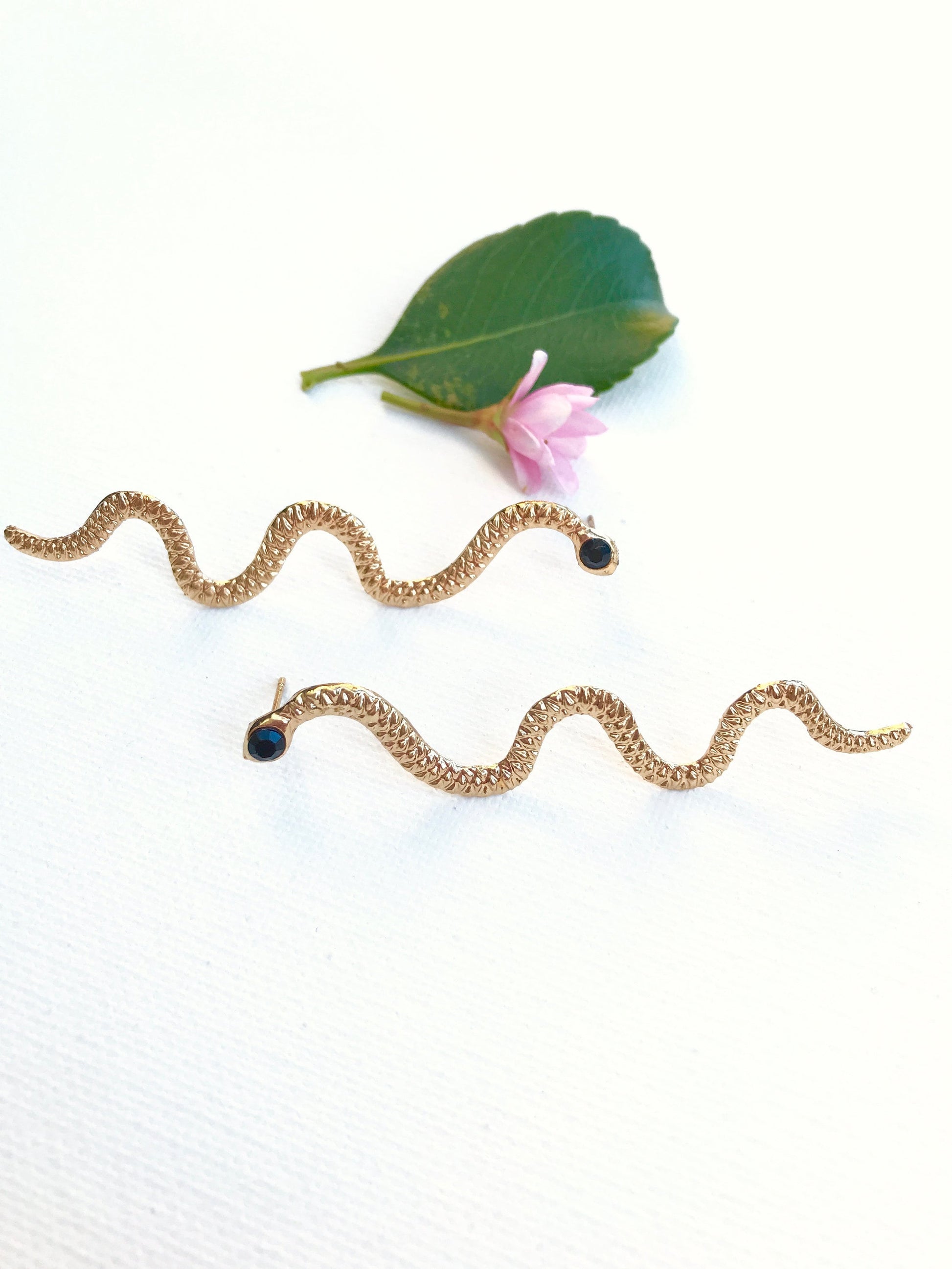 snake studs